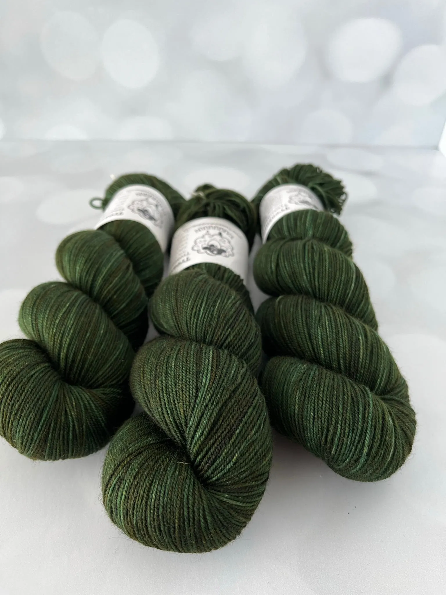 Land Ho! Treasured Yak Toes Sock Yarn, forest green yarn