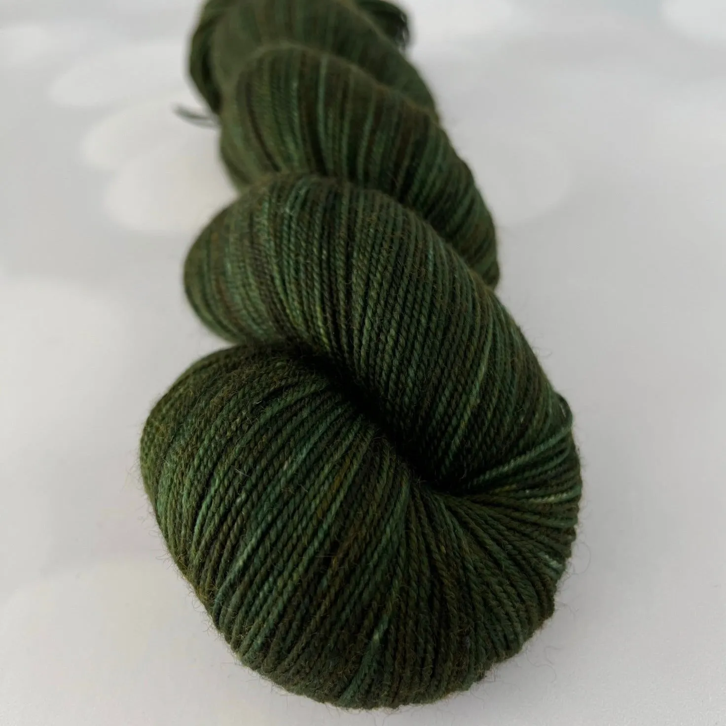 Land Ho! Treasured Yak Toes Sock Yarn, forest green yarn