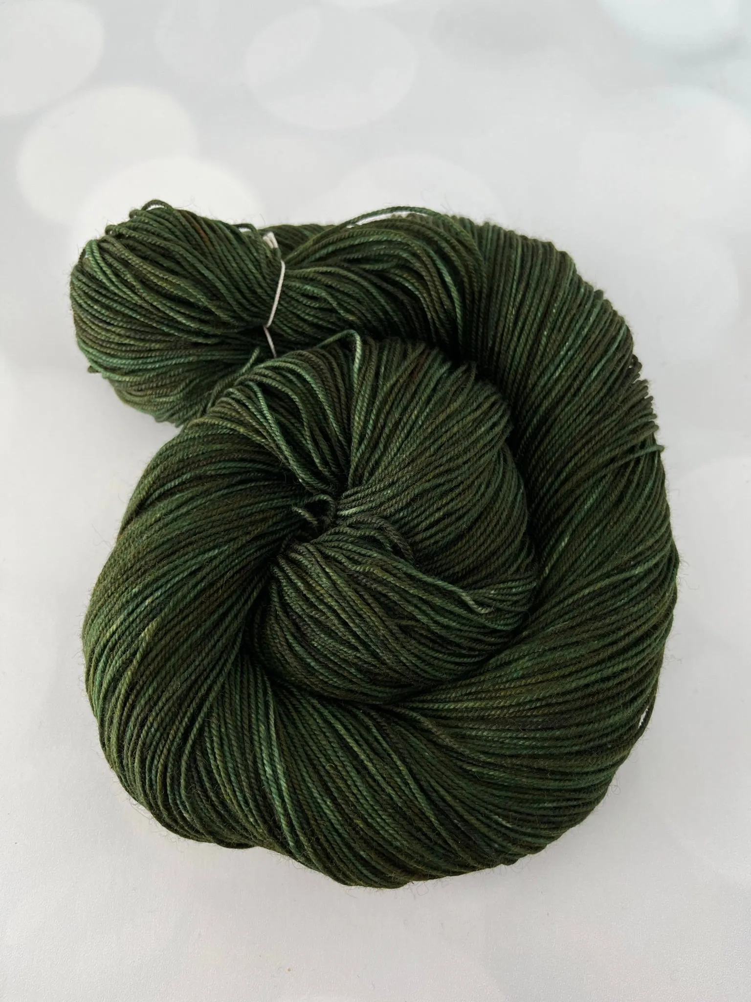 Land Ho! Treasured Yak Toes Sock Yarn, forest green yarn