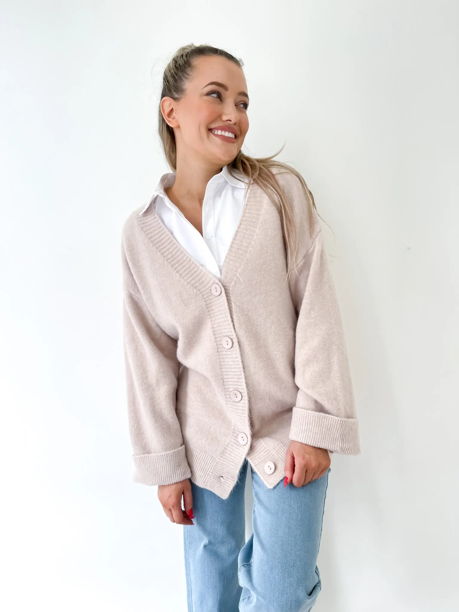 Stone Coloured Winter Cardigan with a generous oversize fit and wide cuffs by Fria the Label.